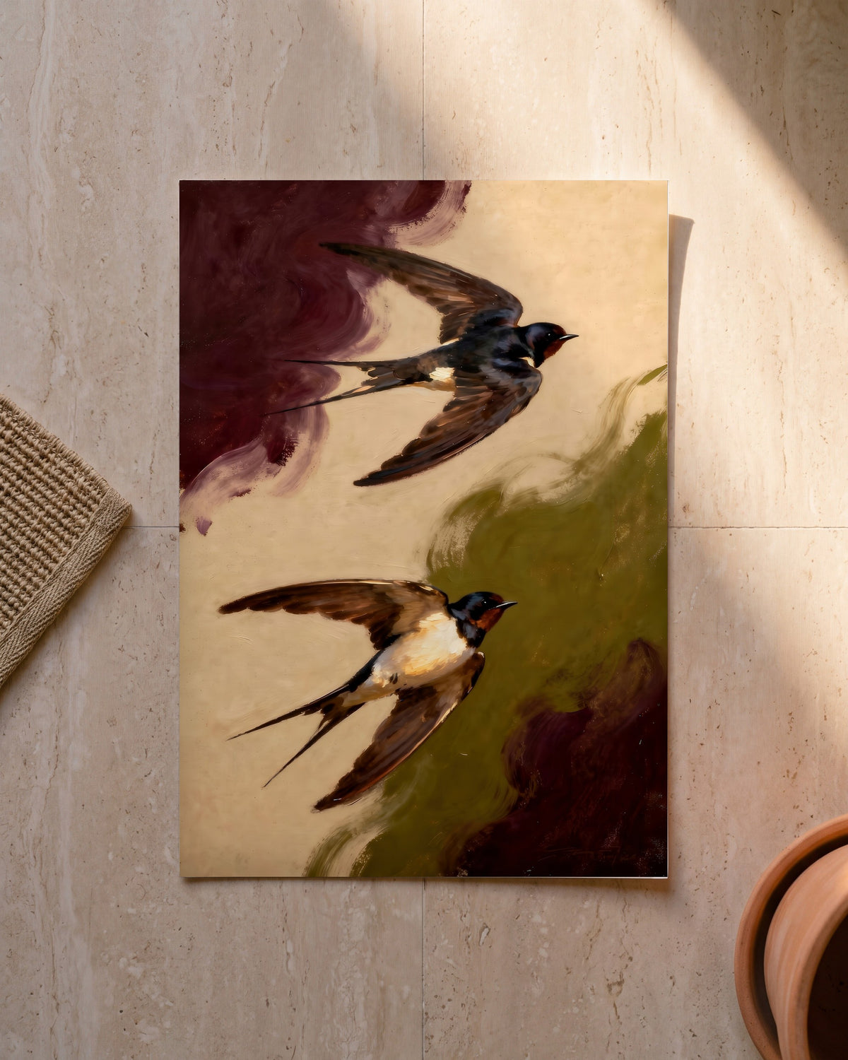 Plakat Dwie jaskółki bez ramy, oparty o ścianę na podłodze